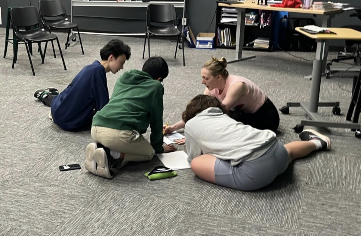 Ms. Norland and her students during early rehearsal for A Midsummer Night's Dream.